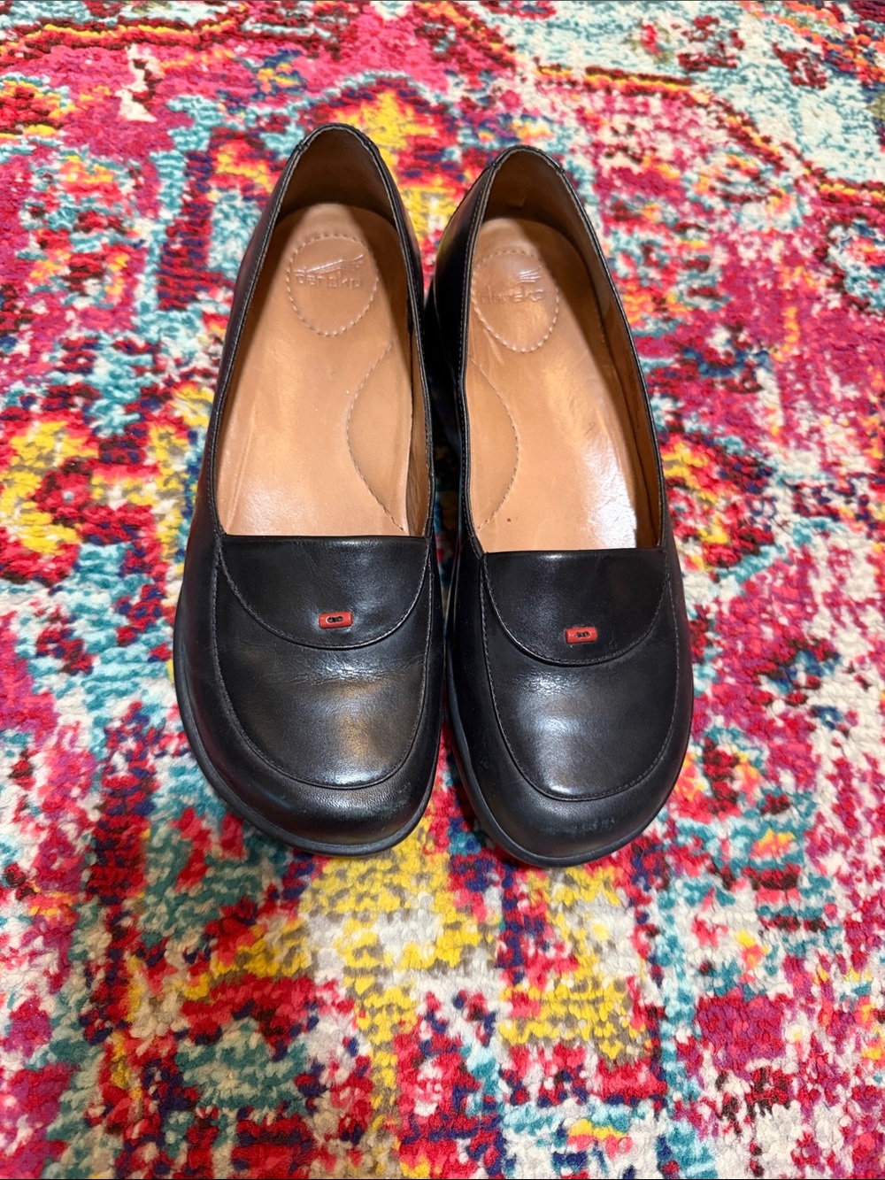 Dansko Black Leather Slip-On Loafers with Tan Insole Accents